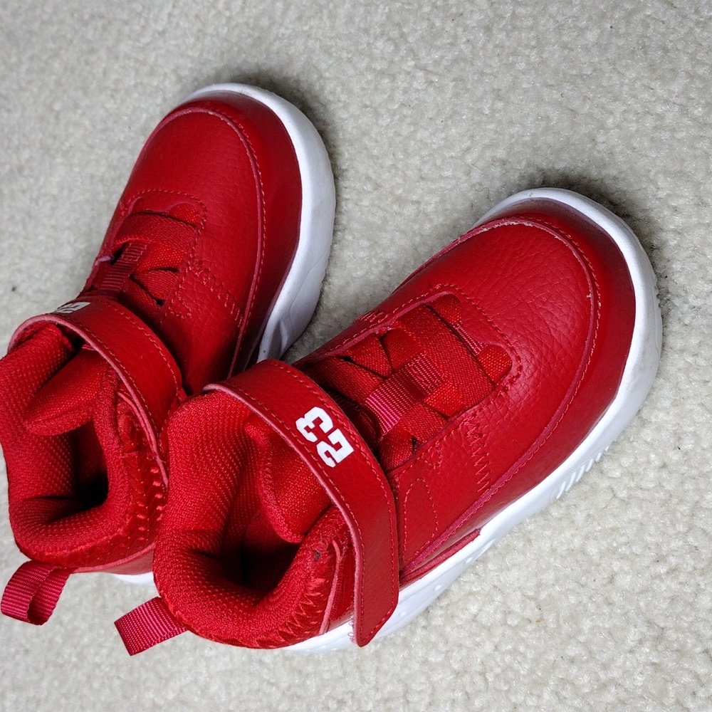 Air Jordan boys red sneakers. Mint condition. Size 7.5